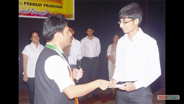 Student Mr.Romil Golani receiving 'Best Student of Year Award'